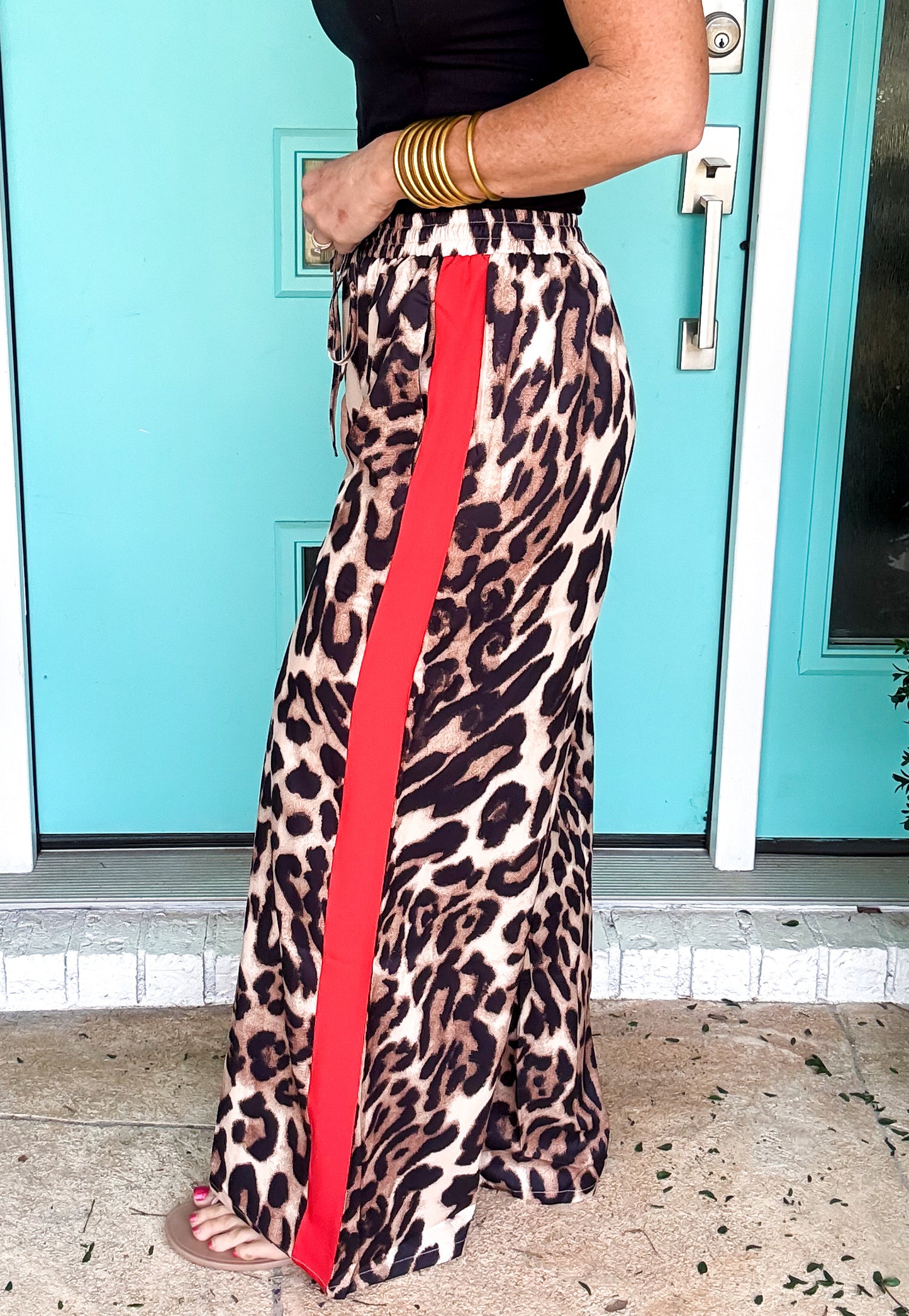 Roaring in Red Leopard Pants